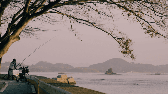 Fisherman on quiet beach