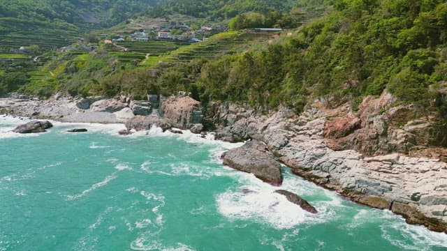 Coastal cliffs and terraced fields