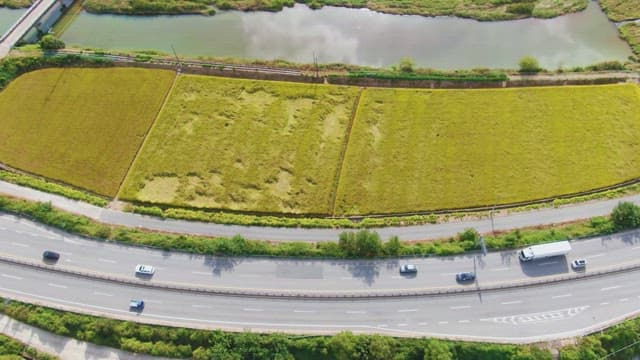 View of fields and a highway