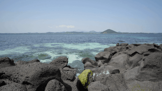 Rocky shore with clear blue sea