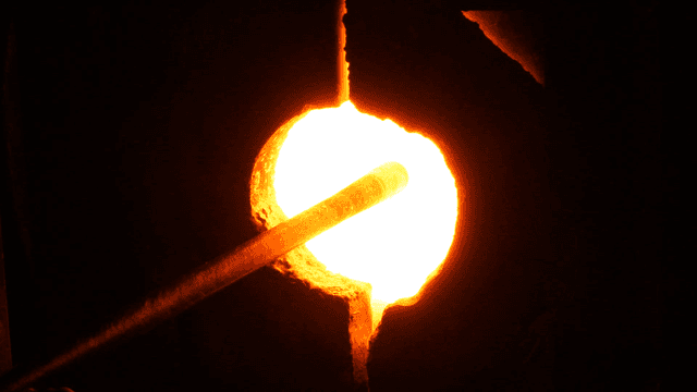 Glass rods rotating in furnace