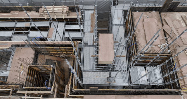 Construction site with scaffolding and materials