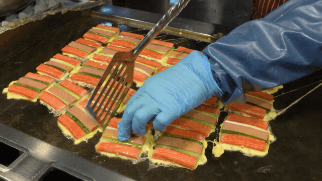 Skewered pancakes cooked on griddle