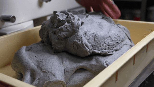 Dough being kneaded in a tray