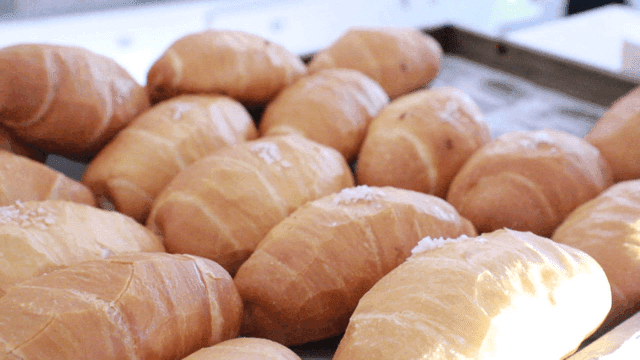 Freshly baked salt bread on display in bakery