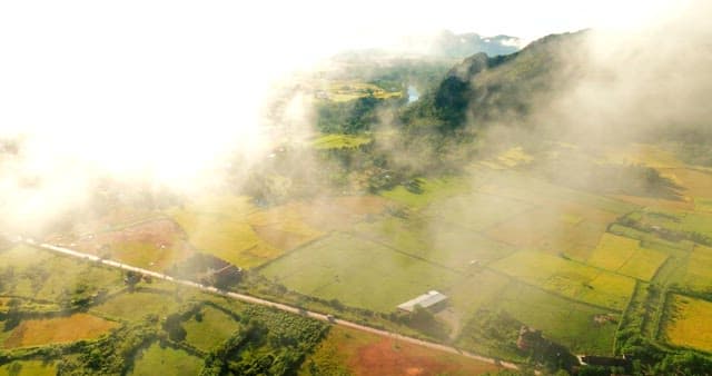 Aerial view of rural landscape at sunrise