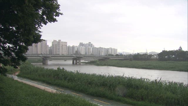 Urban riverside scenery on a cloudy day