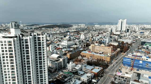 City view with roads beyond high-rise buildings