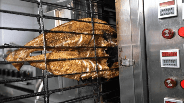 Grilled fish cooked in vertical oven