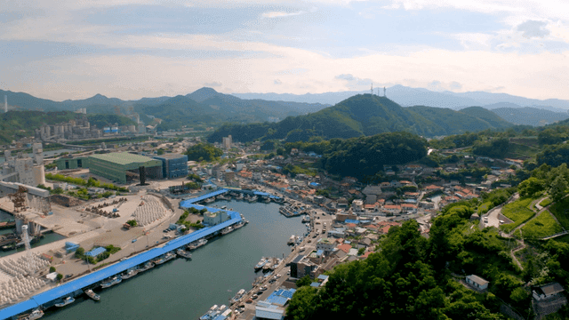 Coastal village surrounded by mountains