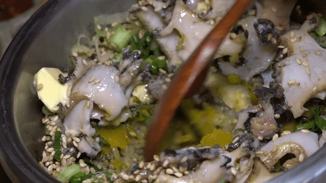Abalone rice with butter and sesame seeds