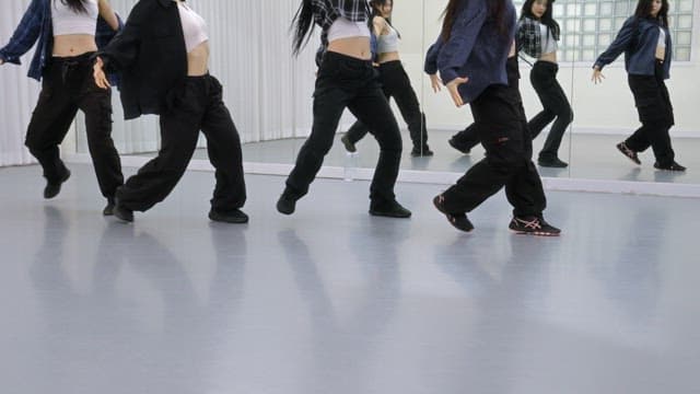 K-POP Dancers Practicing in a Studio