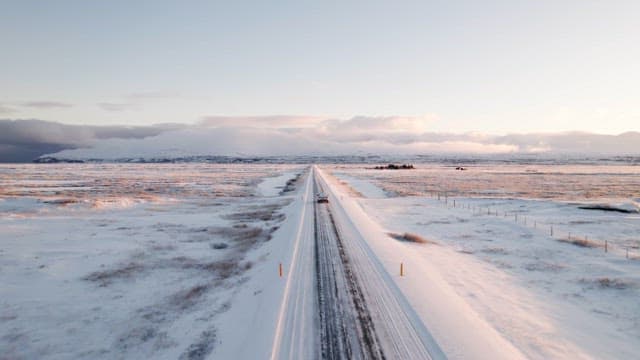 Car driving on a snowy road