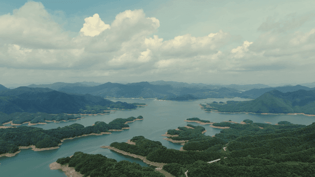 Vast lake surrounded by lush mountains
