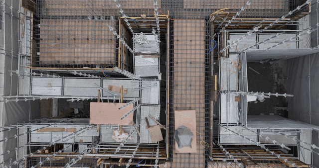 Construction site with materials and scaffolding