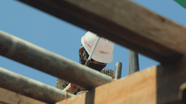 Construction worker wearing a helmet