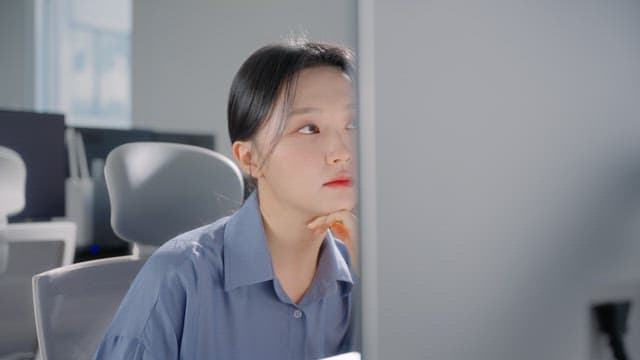 Woman working at a desk in an office