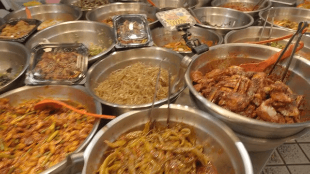 Various Korean side dishes on display