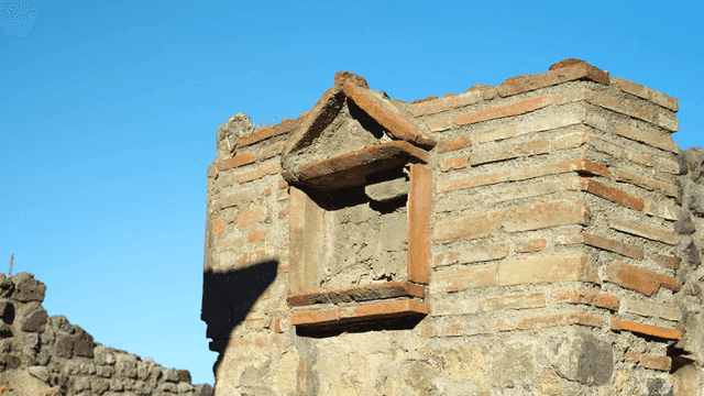 Ancient brick structure under clear sky