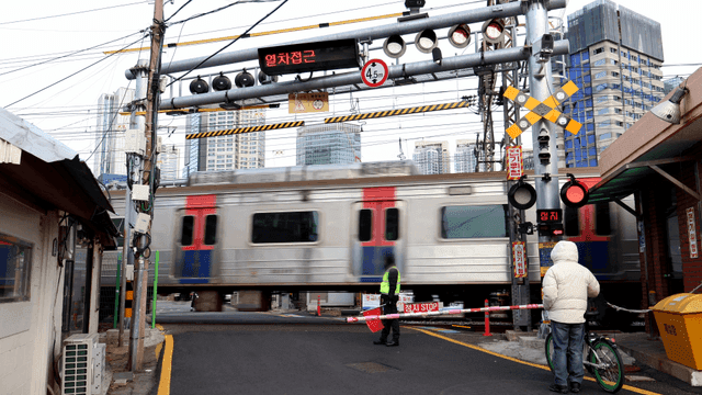 Train passing through a city crossing