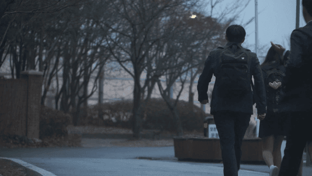 Students walking from school in the evening