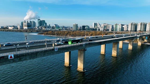 Traffic flowing over a bridge in a modern city