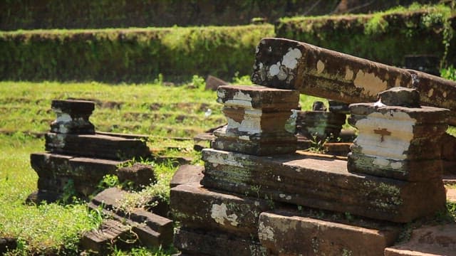 Ancient stone ruins in a grassy field