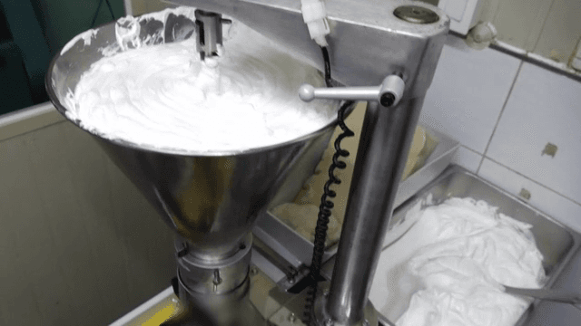 Industrial machine mixing cream