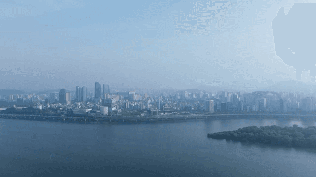 City skyline with river and island