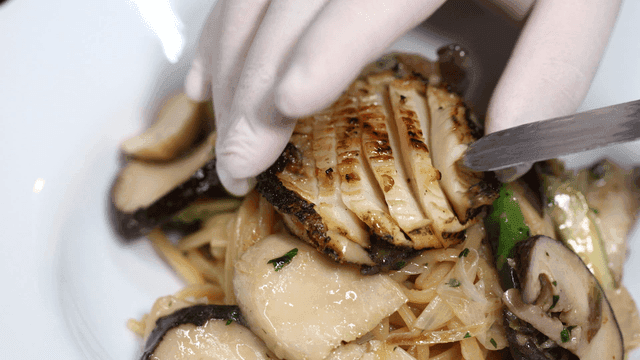 Seafood pasta topped with abalone