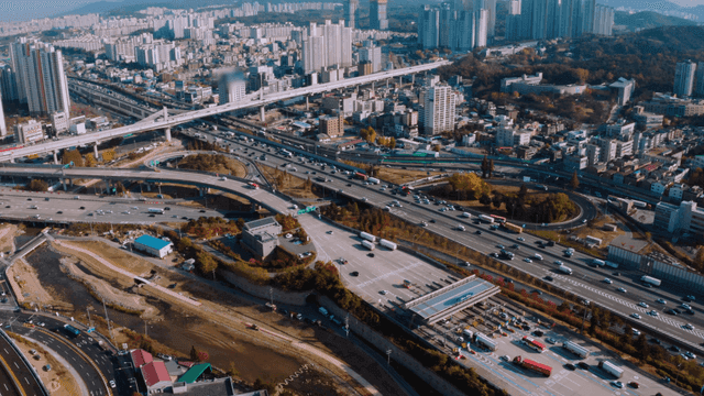 A bustling city with highways and skyscrapers