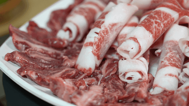 Thin assorted beef cuts on plate