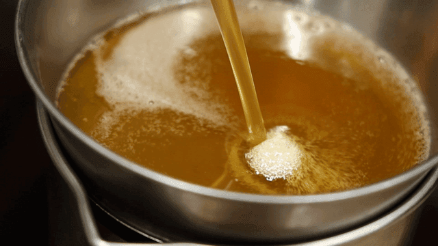 Sesame oil being poured into pot