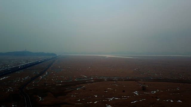 Scenery of wide open fields and roads