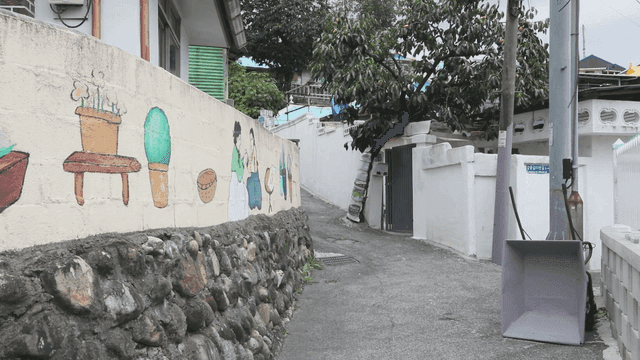 Quiet alley with wall murals