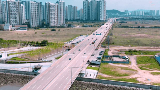 Busy highway with high-rise buildings