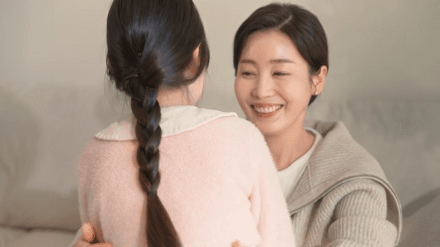 Mother and daughter sharing a warm hug