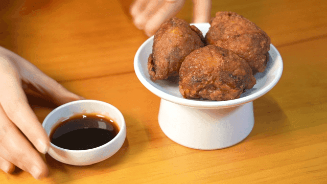 Crispy chicken skin dumplings with soy sauce