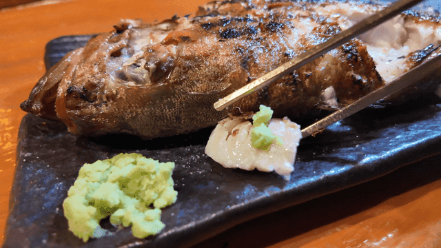 Grilled fish with wasabi on plate