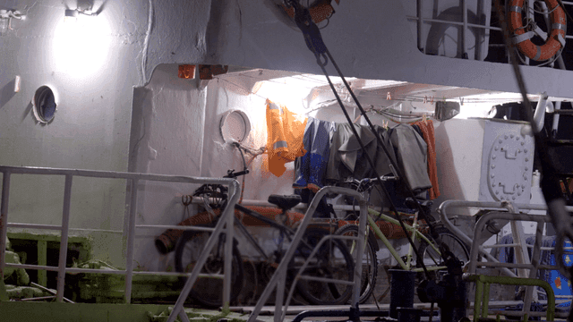 Bicycles and clothes on a ship deck