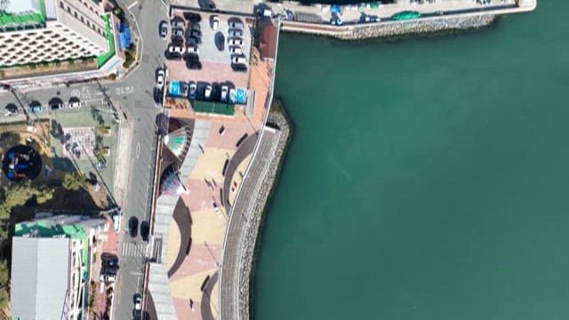 Urban Coastline with Public Parking Lot