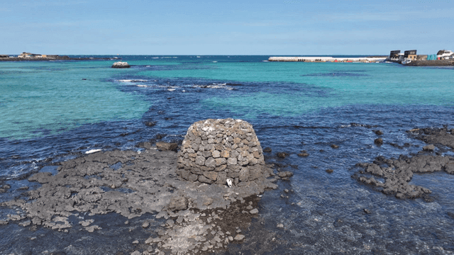 Clear blue sea and rocky coast