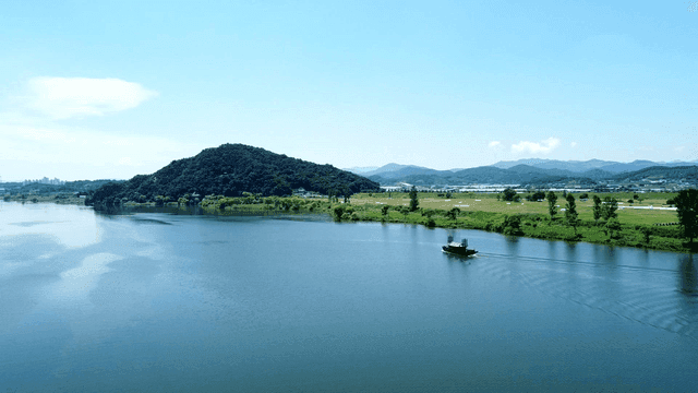 Quiet river with Panokseon ships and mountains