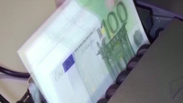 European Currency Being Counted on a Counting Machine of Bank