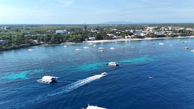 Coastal town with boats on the sea