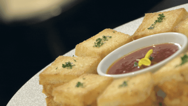 Crispy Menbosha served with sauce