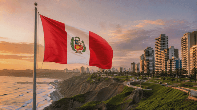 City skyline with Peruvian flag at sunset
