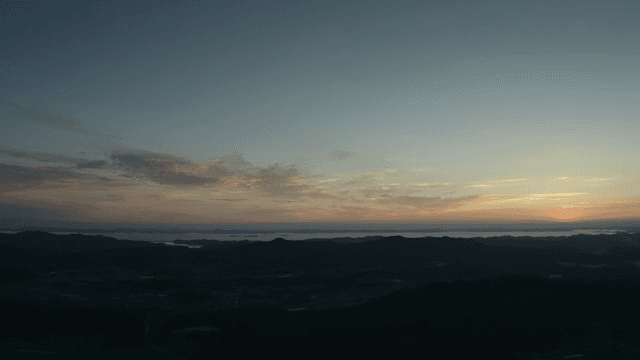 Sunset over a serene landscape