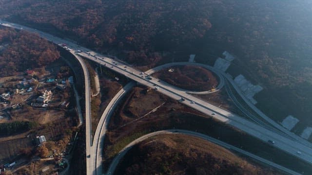 Highway Interchange with Many Cars in Autumn