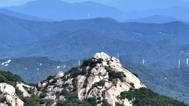 Buramsan mountain peak with lush greenery